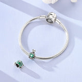 Smiling Turtle with Green Heart Charm